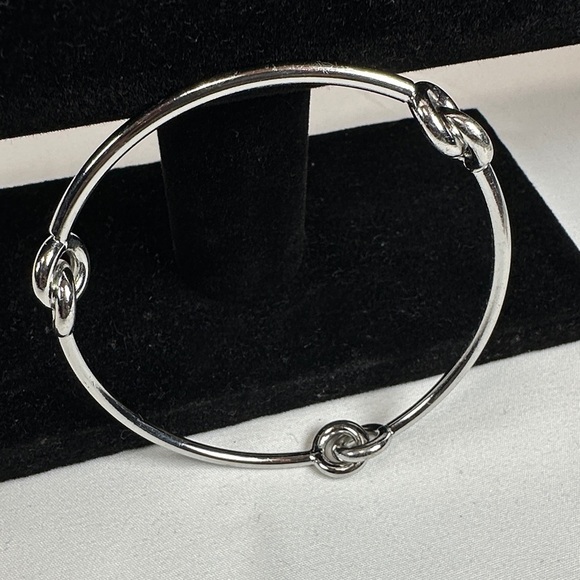 Elegant Silver Tone Knot Bracelet - Picture 6 of 7